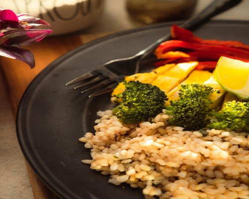 A well portioned plate with vegetables and grains